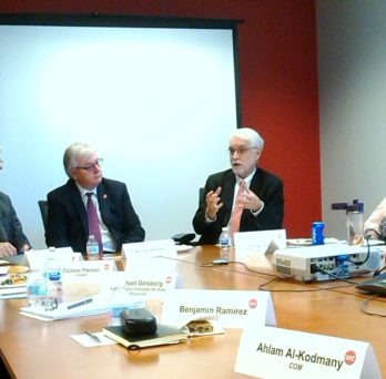 UIC Chancellor and President speaking with APAC.
                  