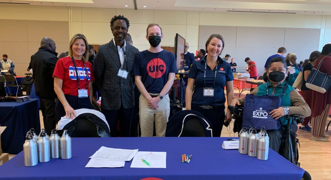 Four Committee members and Graduate Assistant attending the Fall 2022 UIC All Employee EXPO